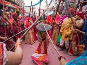 "Families and friends enjoying the Holi Festival 2025, celebrating unity and joy with colorful powders." 